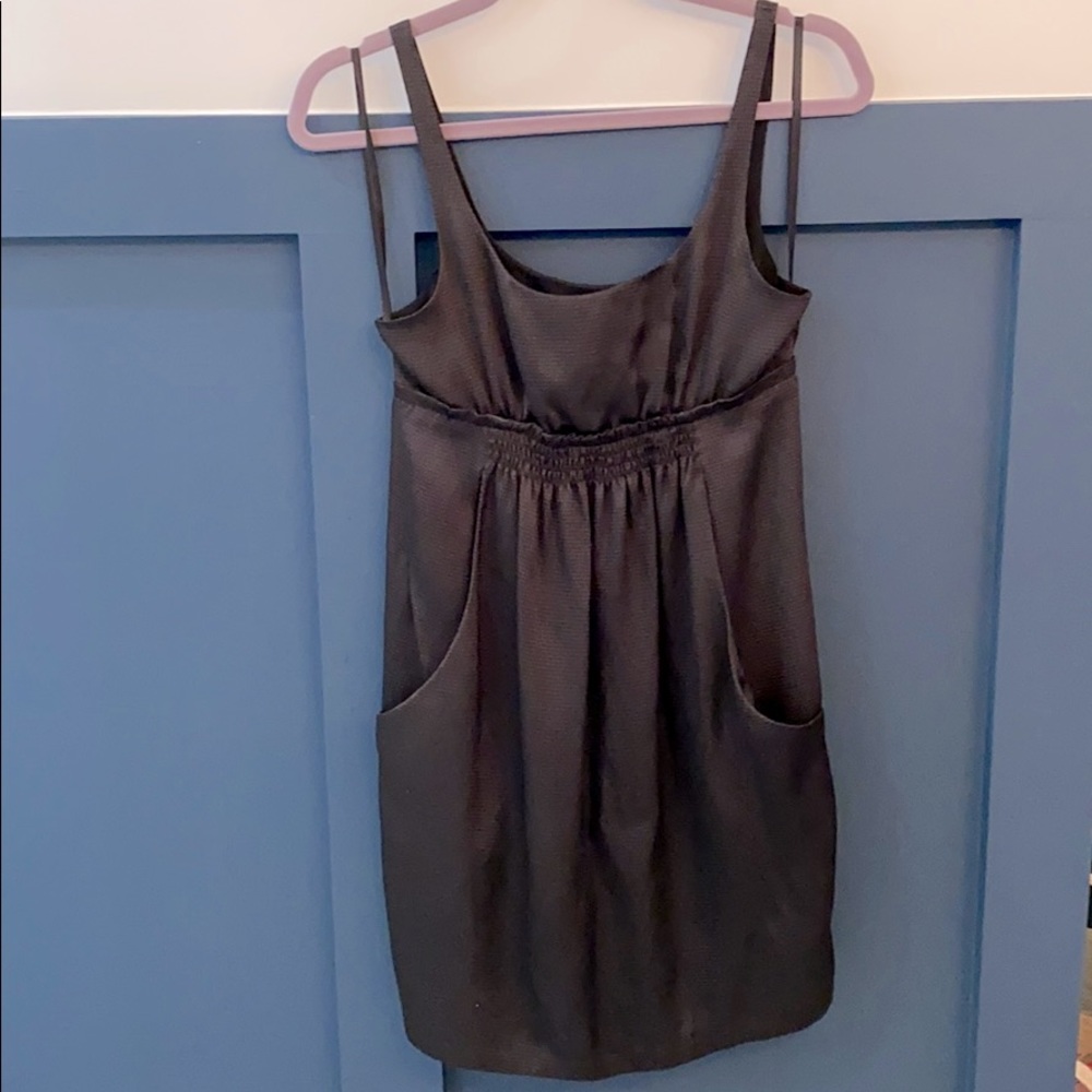 Black dress with scoop neck and pockets